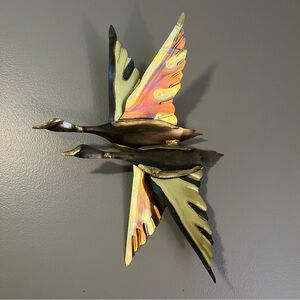 vintage mid-century modern metal wall art piece depicting flying geese.